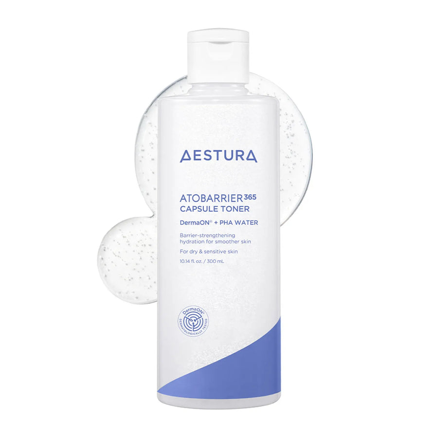 A 300 mL bottle of Aestura AtobARRIER 365 Capsule Toner on a white background, featuring a white bottle with blue text and a blue wave design at the bottom, with floating clear gel spheres behind it.
