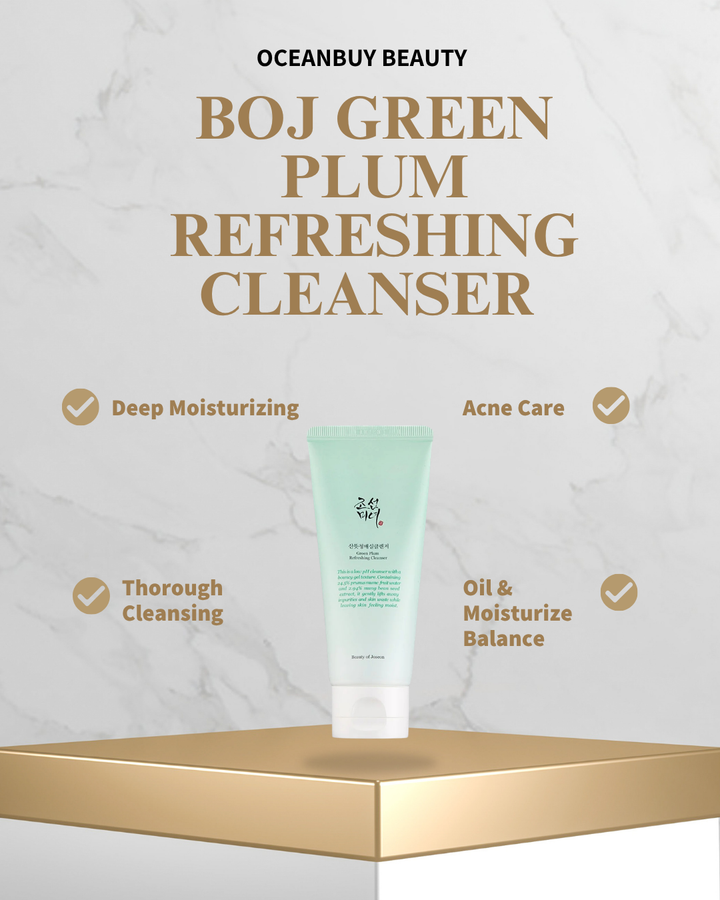 Oceanbuy Beauty Boj Green Plum Refreshing Cleanser in a mint green squeeze tube, displayed on a gold pedestal against a light marble background with product benefits listed around it.